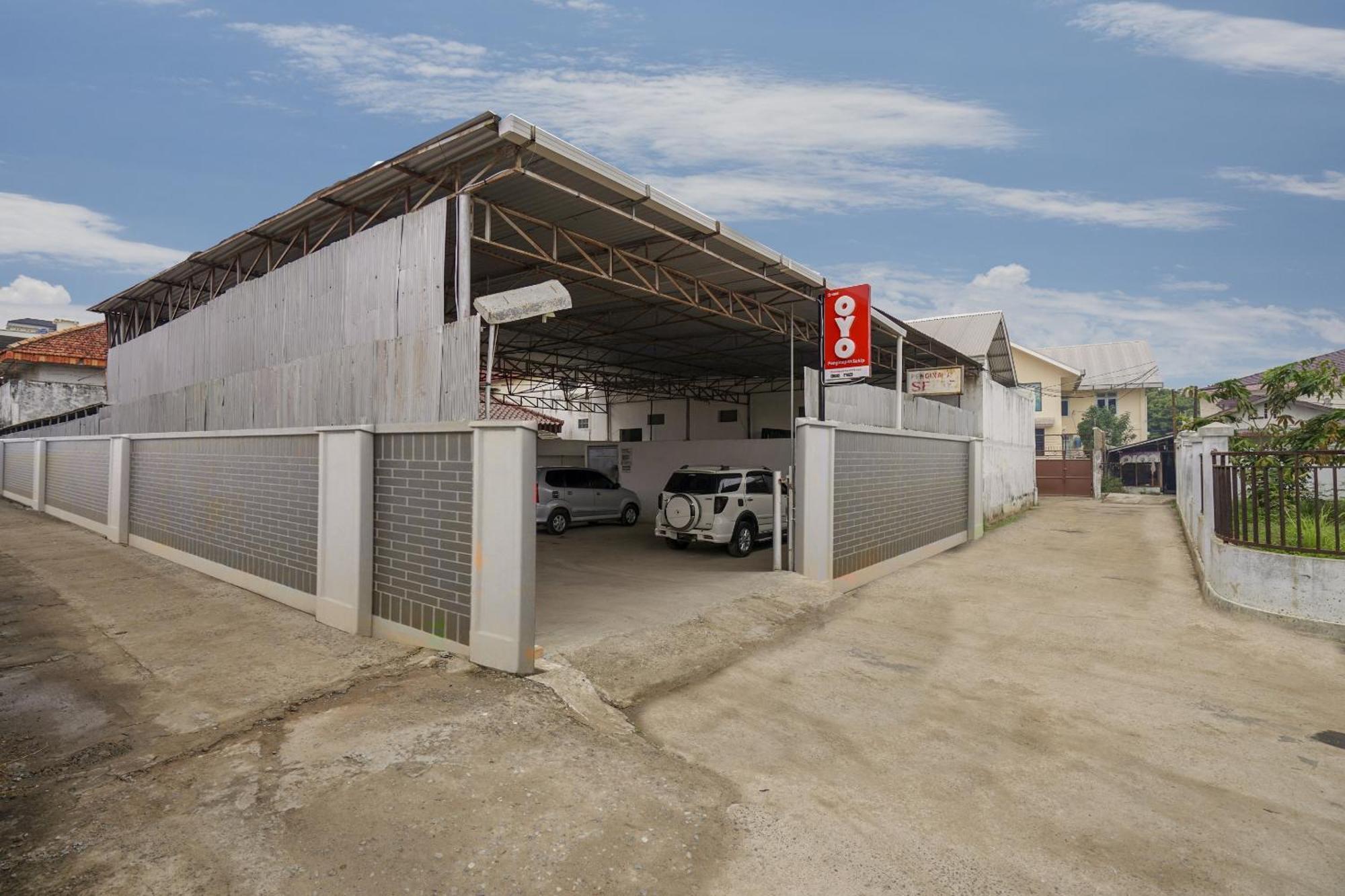Oyo 1868塞基普酒店 巨港 外观 照片